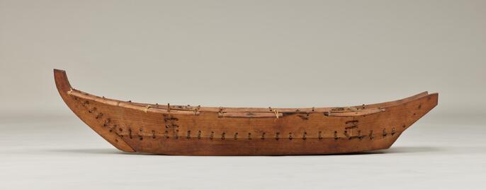 Model of an Ainu sewn boat, 19th century, Tokyo National Museum, Japan.
The Ainu used sewn-plank boats both for fishing and for trading with Mainland Asia and the rest of Japan. Their vessels were usually propelled both by oars and a sail.