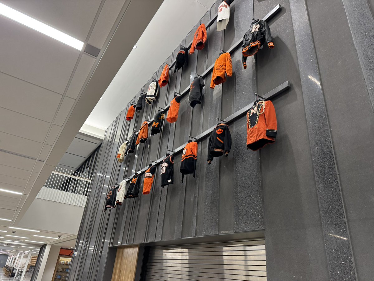 The Spud Jersey and Uniform Wall at the new Moorhead High School is  complete.

Special thanks to Shelly Connelly and her sons Jack and Grant (in photo on the lift) who helped make this display possible as funds for the project were provided by the Steve Connelly memorial.