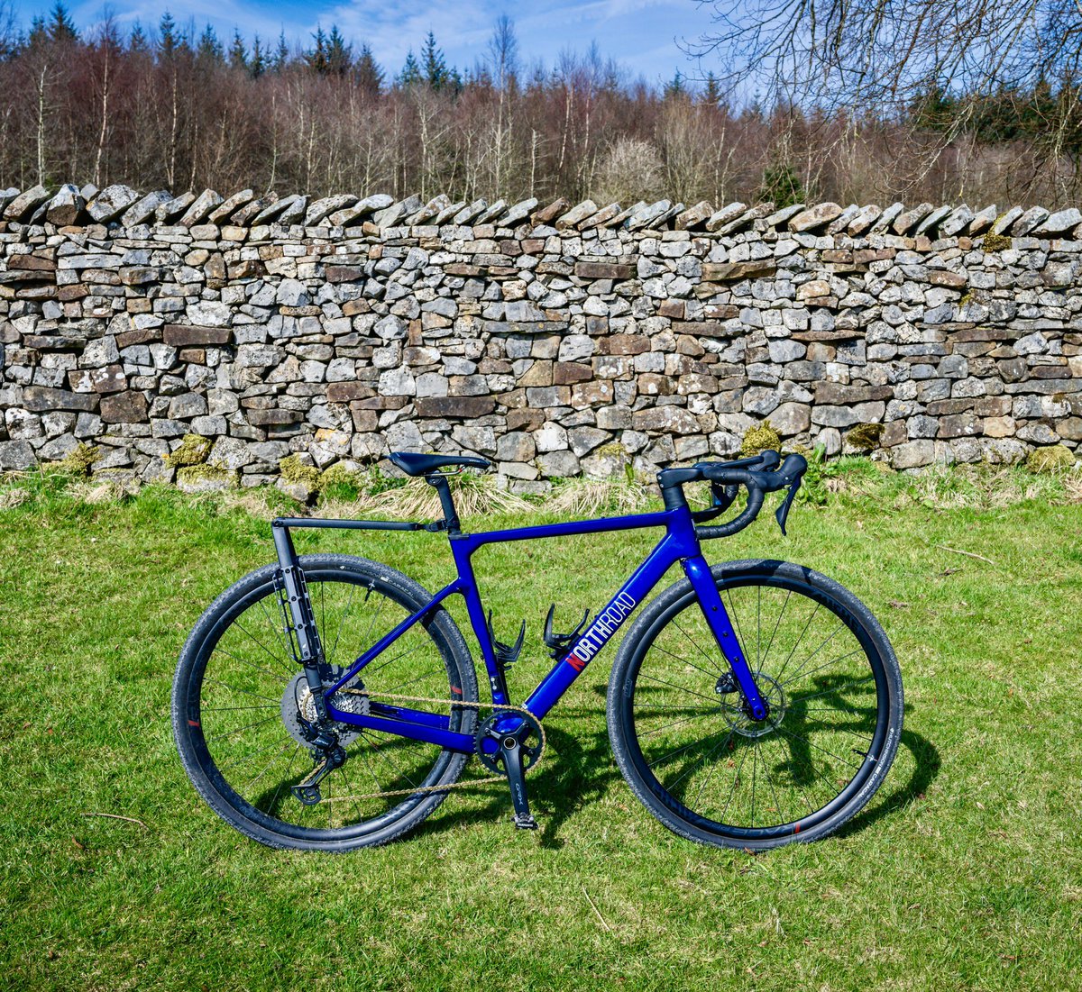 Daughter’s new bike <a href="/NorthRoadCycles/">NorthRoadCycles 🚴‍♂️</a> Quest with <a href="/TailfinCycling/">Tailfin</a> rack.
38 mile loop yesterday including the gravel tracks at Gisburn Forest.
#gravelbike #northroadcycles #gisburnforest #bowland #tailfin