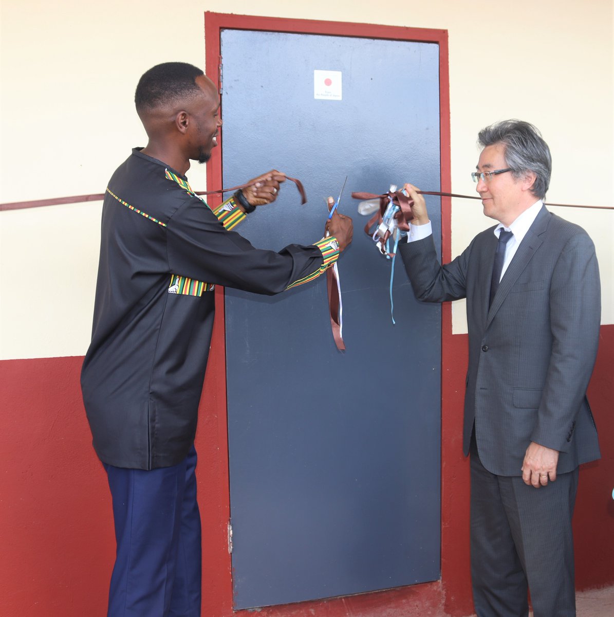 EoJZimbabwe's tweet photo. On March 25, Ambassador Yamanaka attended a handover of classroom blocks and a teachers' house at Gobakhulu Primary School in Lupane, funded with USD 72,000 by Japan. He thanked Hand in Hand and the Government of Zimbabwe, and urged continued cooperation for quality education. https://t.co/QfsSAD9p0i