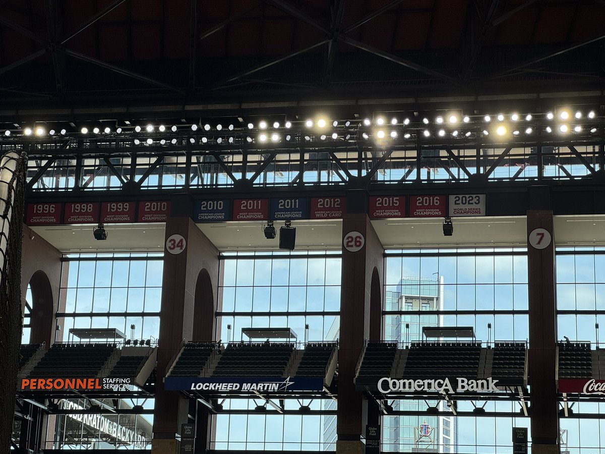 MikeLeslieWFAA's tweet photo. I checked with the Rangers - the banner for the 2023 World Series that was hung above right field was never intended to be permanent. 

It has been taken down. The permanent representation of the 2023 Championship is the white placard above left field, that sits next to all the other postseason accomplishments of season’s past.
