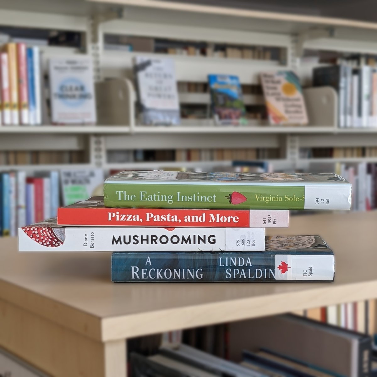 April is Poetry Month, and library staff made some book spine poems to celebrate!