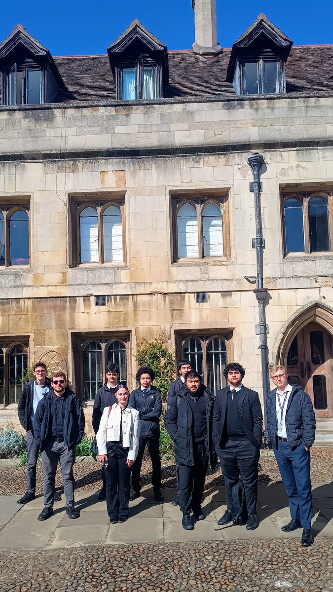 Mr Baker standing with eight ambitious Year 12 students in the Old Court, Pembroke College, Cambridge (founded in 1347) during their taster day today 🏫