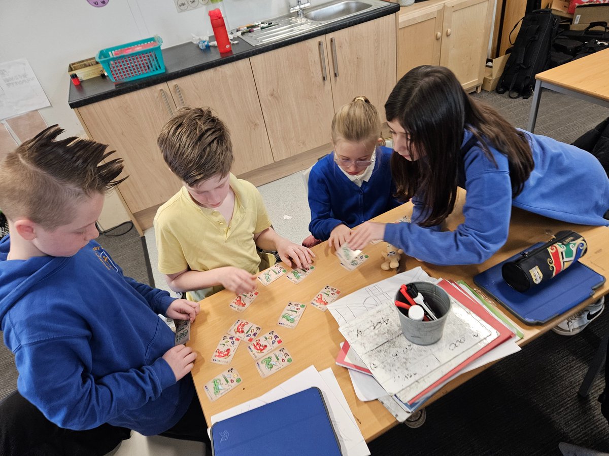 P6 learning all about data using our Dragonistic card game!