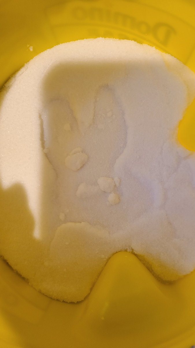 So I know people have claimed to see Jesus on random objects, even food items. Well I guess the Easter Bunny has decided to pay an early visit to my house cuz when I opened up our tub of Domino Sugar that hasn't been touched in about 3 months, there he is staring me in the face.