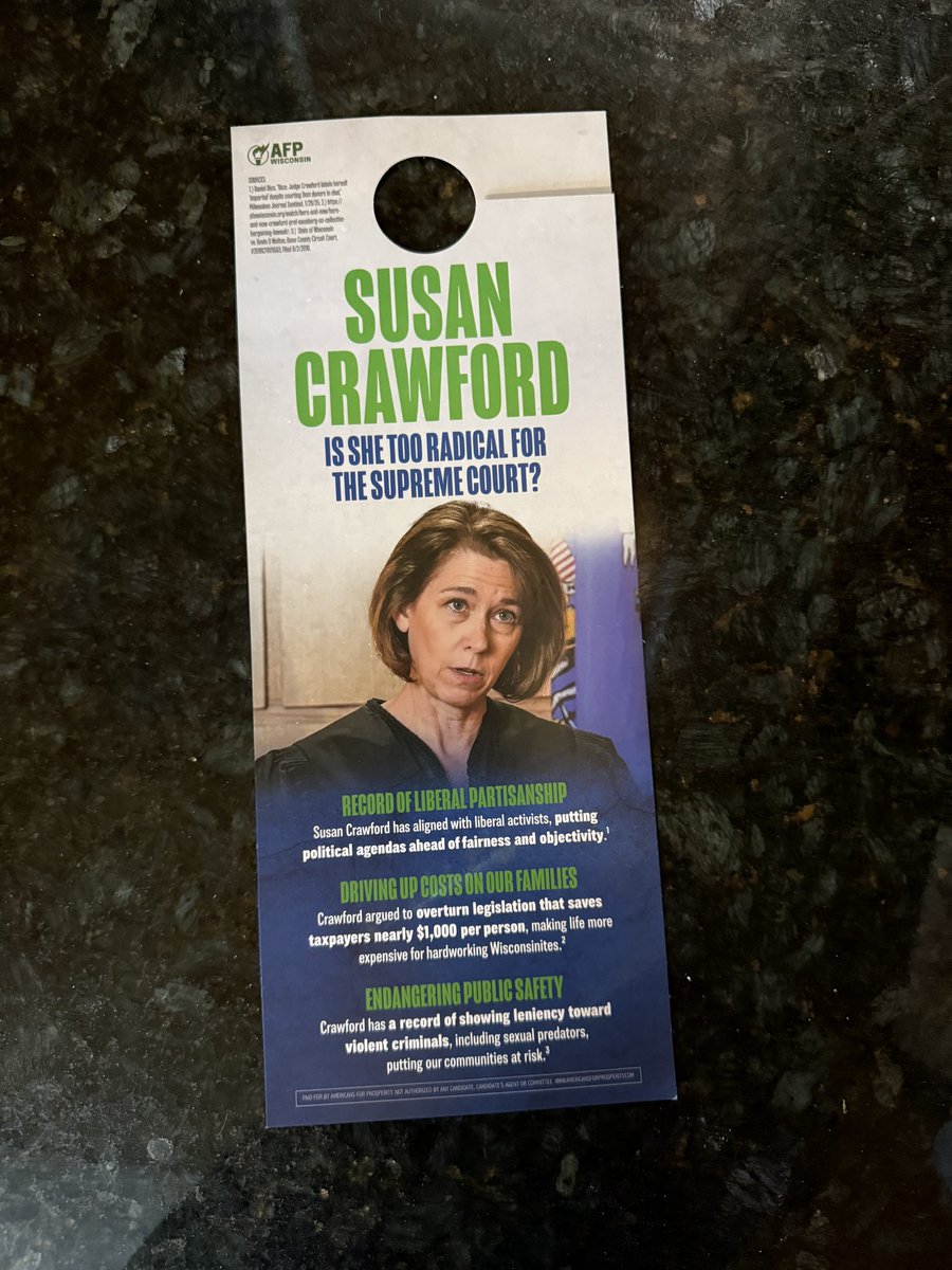 I live on a dead end road in rural Dunn county, WI

Never before has my door been knocked other than by a dude selling science text books 5 yrs ago. 

That changed today. Americans for Prosperity knocked on my door.
I was too late to answer but they left this door hanger