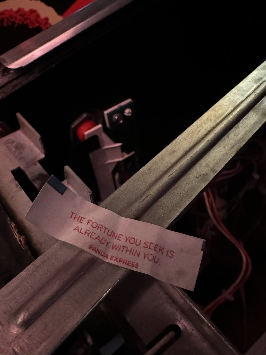 legacy_dave's tweet image. If you accidentally break the piece of plastic that triggers 1 of the 2 opto flipper sensors in a late 90s Bally pinball the machine will be understand if you put a folded up piece of paper (a fortune from my pocket in this case) and some electrical tape there