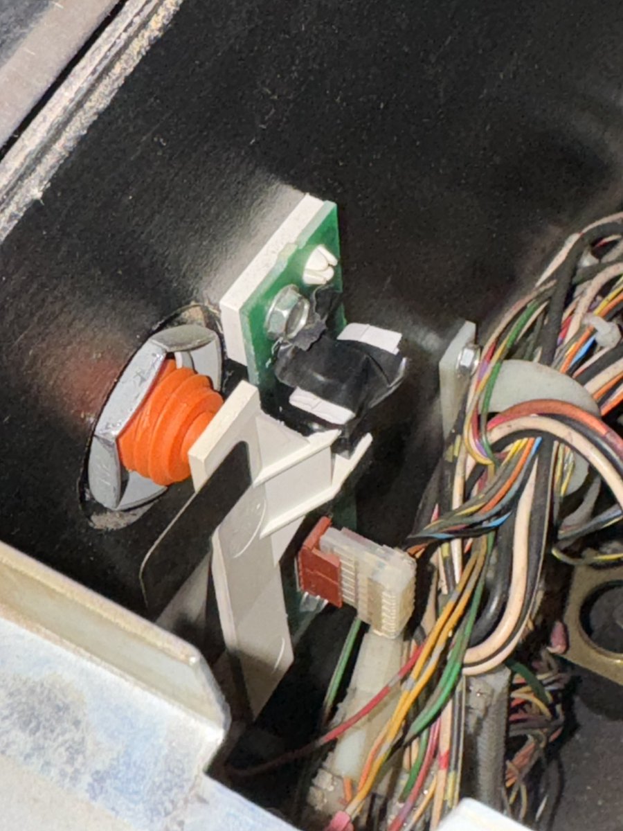 legacy_dave's tweet image. If you accidentally break the piece of plastic that triggers 1 of the 2 opto flipper sensors in a late 90s Bally pinball the machine will be understand if you put a folded up piece of paper (a fortune from my pocket in this case) and some electrical tape there