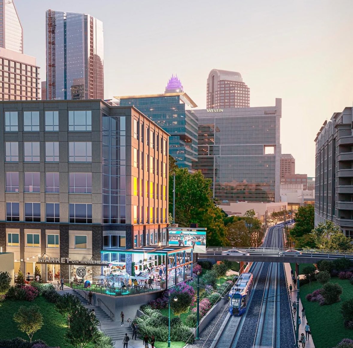 The rail trail in Charlotte keeps getting better!

Coming Dec. 2025 - The Market on Morehead

• Indoor &amp; outdoor stages for live entertainment 
• Giant deck overlooking the rail trail
• 25’ Jumbotron for watching sports