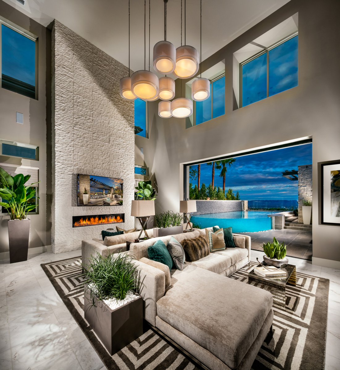 What do you like about this space? Coronado Stone Products 12x24" Chiseled Limestone / Cream used to create this uniquely textured fireplace! #design #style #open #modern See more at coronado.com