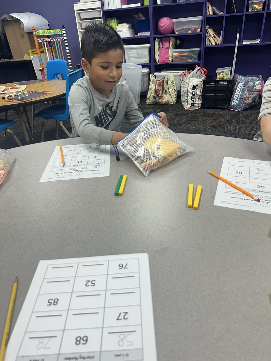 MHuntMISD's tweet image. First graders are working hard on their place value skills using base ten blocks! Watching them build numbers and break them down into tens and ones is amazing. Hands-on learning at its best! #PlaceValue #BaseTenBlocks #FirstGradeMath @Alaina_Boaz