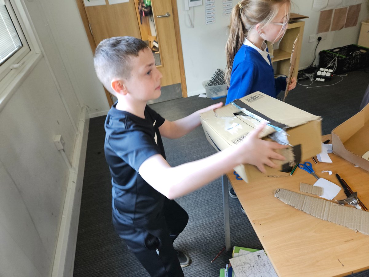 P6 exploring our right to play through bring a box Friday! Some amazing creations, such creativity and problem solving, even some 3d nets! #UNCRC