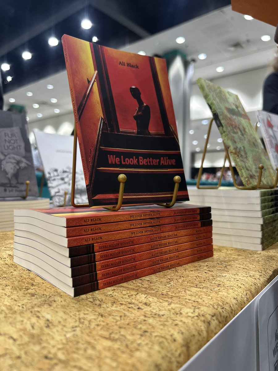 Met my book (We Look Better Alive) at <a href="/awpwriter/">AWP</a> today! 🥺 It’s such a beauty. Feels good in my hands. Feels even better in my heart. These poems are finally out in the world! Wow. ☺️