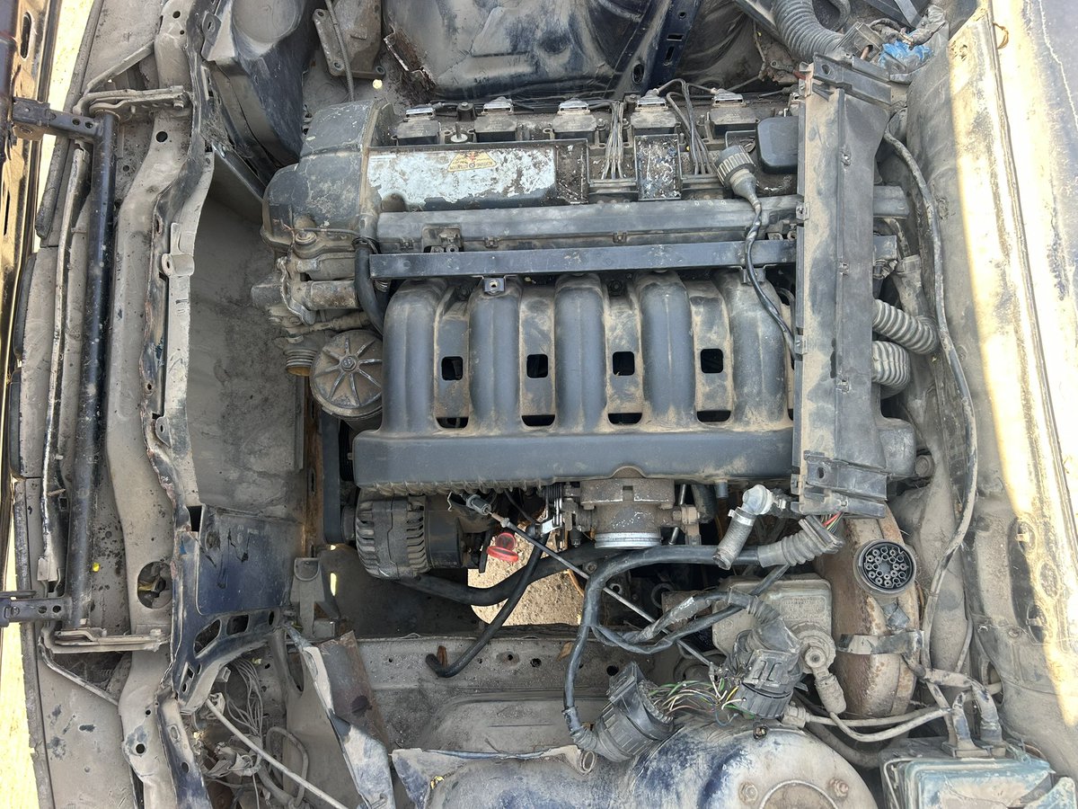 RegularCudjoe's tweet image. See the car on the right? 
It’s swallowed an M50 6 cylinder 
We go wire the electricals and fire it up!

Mo powah bebey!