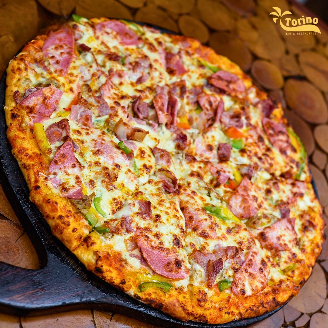 TorinoKampala's tweet image. Pizza so good, you&apos;ll be fighting for the last slice like it&apos;s a championship title! 🍕🥋😂 #torinokampala #PizzaPerfection #SliceOfHeaven