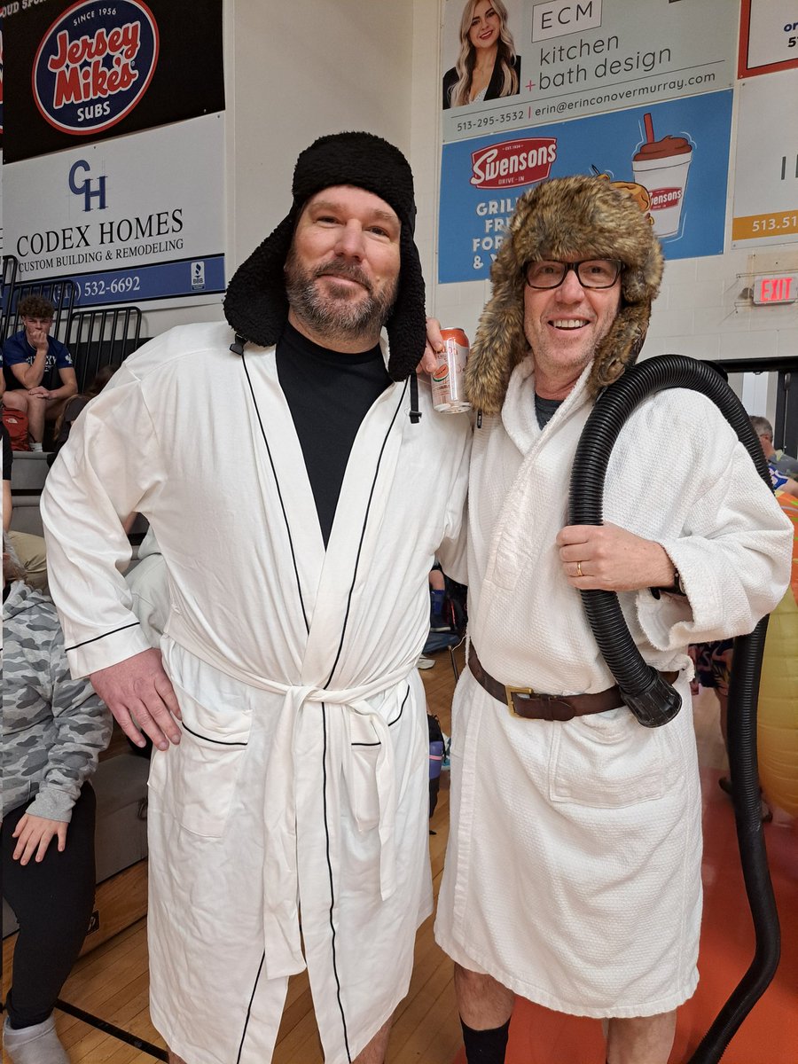 Fouss's tweet image. Math teachers representing at the Academic Pep Rally! Can you name the movie? @AndersonRaptors
