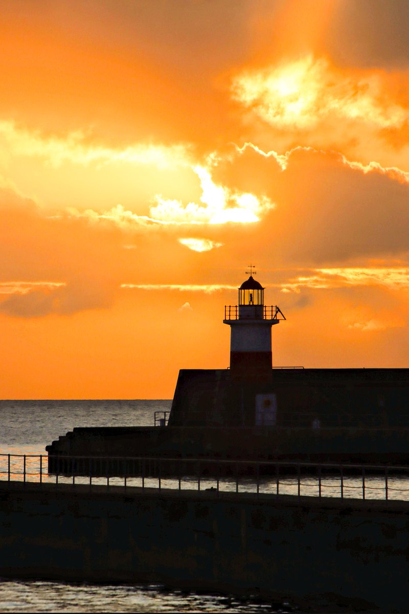 And then the sun pops her lovely head up from underneath the dawn duvet #sunrise #sea #Wicklow #lighthouse