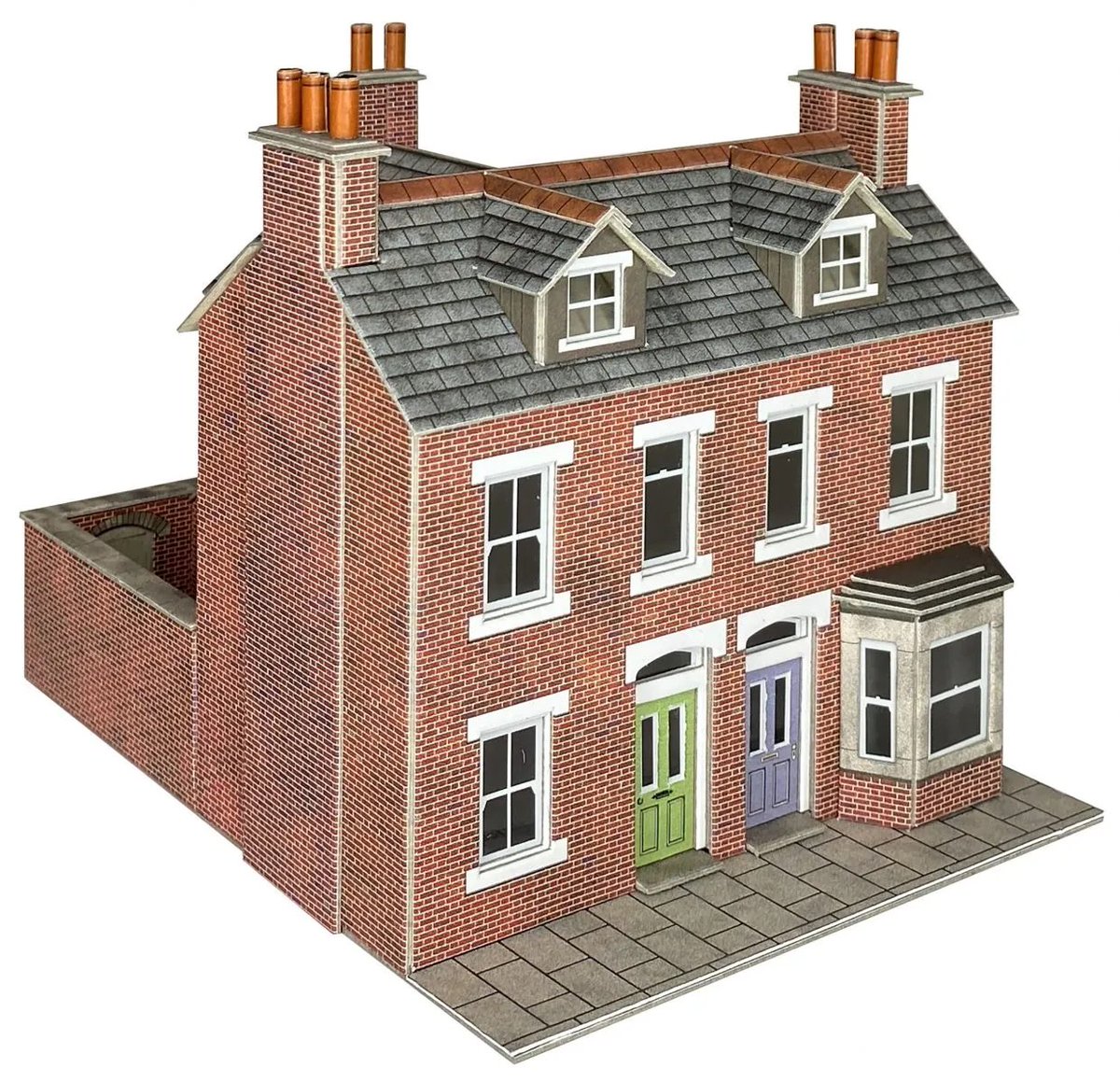 How cute are these? Cardboard kits by <a href="/MetcalfeKits/">Metcalfe Models</a> of corner shops or pubs, in red or grey stone. You can match them with the terraced houses (4th photo) to build whole streets.
They will soon be available on metcalfemodels.com or on our own website one2zmodelshop.com/en/