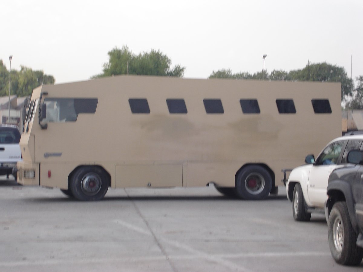 Running2Gunfire's tweet image. The Rhino. This armored bus picked up contractors, civilians and some military personnel from BIAP, and dropped them off in the GreenZone.