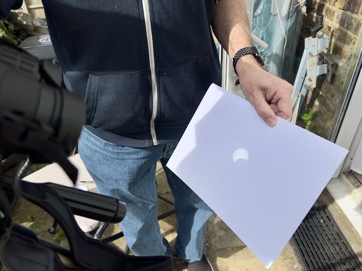 Watching the partial solar eclipse! 🤩. Going to try the colander method next!