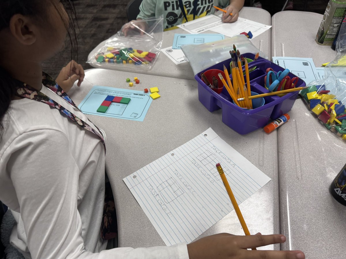 Late post… 3rd graders collaborating with the use of colored tiles to solve for area. Great use of manipulatives!