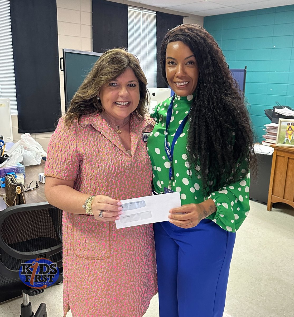 K1Education's tweet photo. #KidsFirst MS Executive Director of Sales & Marketing, Sue Anne Boatman, presented Dr. Natasha Porter, Director of Special Services at Newton Municipal School District, with a $200 Dollars for Kids check she won during our Winter MASS session! ๐งก๐ #GivingBackToKids https://t.co/te3AL4wAut
