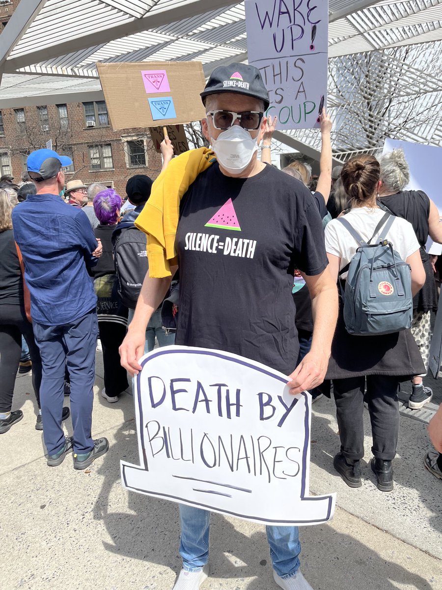 SChenHayes's tweet photo. Live (& dead) @ the @actupny 38th anniversary started at AIDS memorial and ended with die-in at Tesla in #NYC under a 🌈. #FuckBillionaires #FuckFascism #FireDOGE #FireMusk #ActUpFightBack @wrkrsstrikeback @gpny @Cuny4P @paulinepark @gaijingirl2004 https://t.co/Cz5l0gDsbo