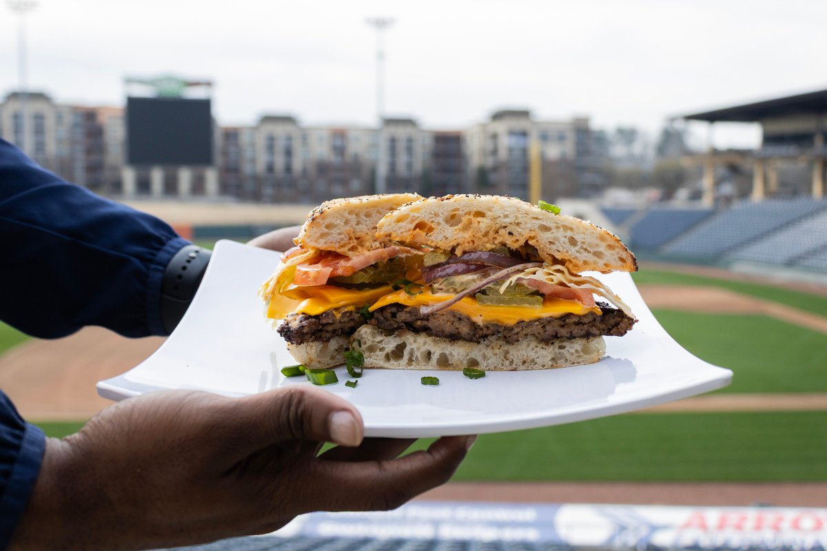 GoStripers's tweet photo. Ballpark burgers will always hit the spot. Especially this one. 
Hitting the menu at Wicked Weed Dugout Bar is The Stripers Burger that is cooked to perfection and is served with house-made boat sauce!

#3DaysAway #HitsCloseToHome https://t.co/5Cr0zhwclC