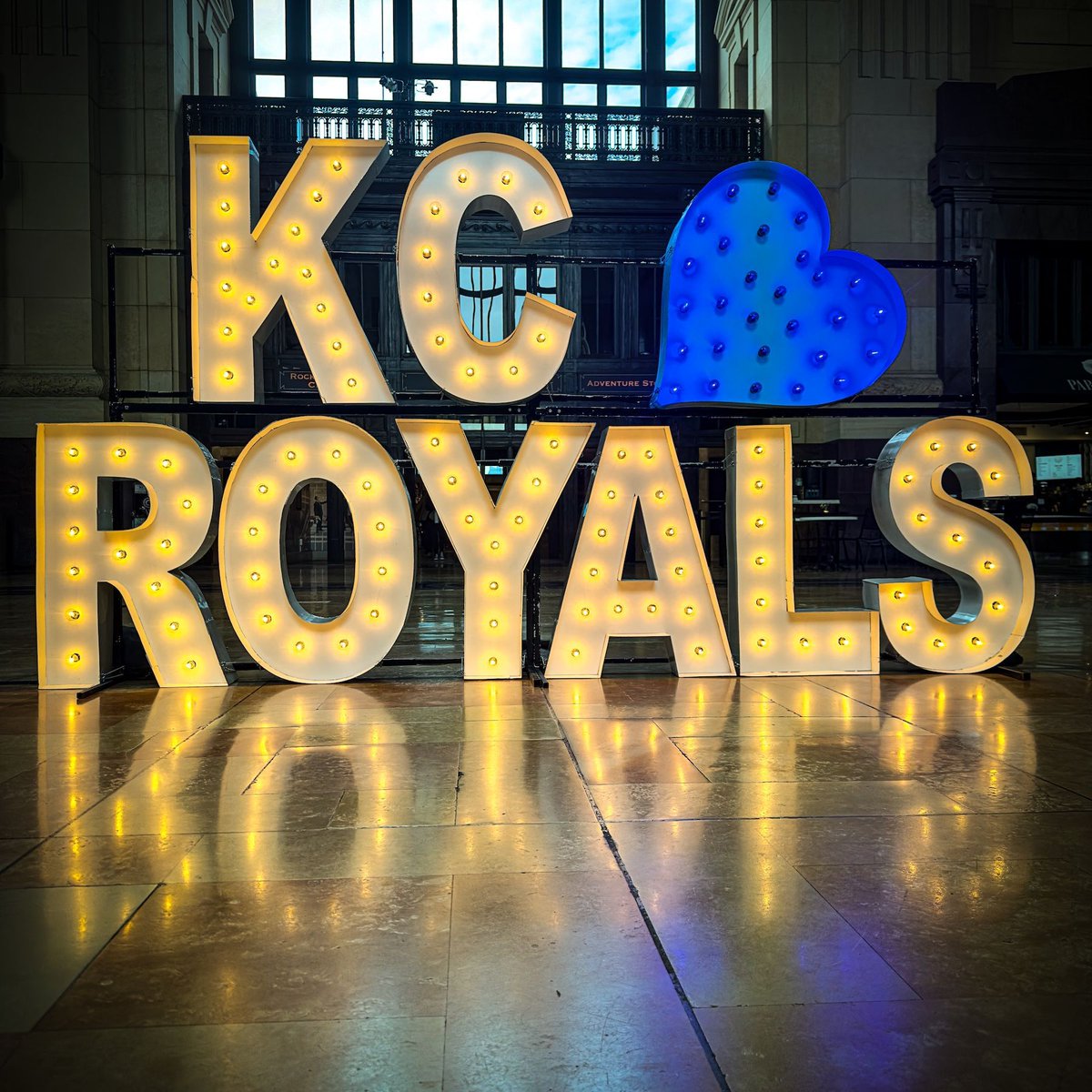 Don't miss your chance to celebrate the new season and show your <a href="/Royals/">Kansas City Royals</a> pride with a fan photo at our new Royals photo op installation from AlhpaLit KC. It's located in our Grand Hall and free to visit from 6am to 11pm daily through Sunday. LET'S GO ROYALS!