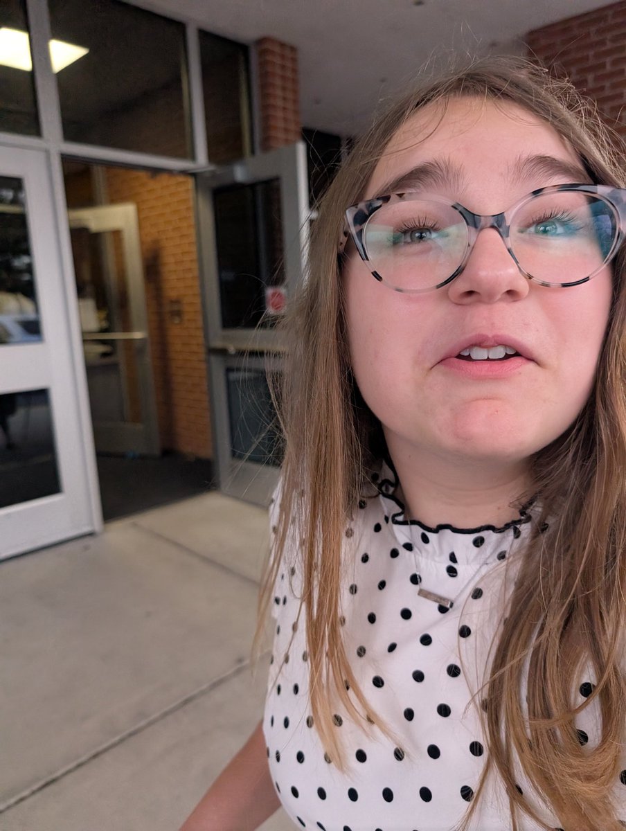 No, she's not surprised that she's accompanying the choir, she just doesn't want me to take the stereotypical parent photo. But we're still proud of <a href="/lplytle/">Lucy</a> being able to sing and accompany the choir with her piano teacher conducting.