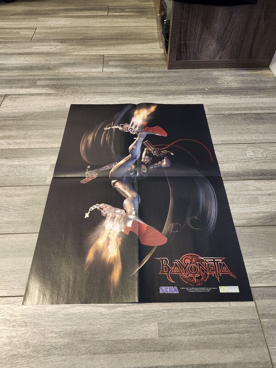 BayoCollector's tweet image. Rare Bayonetta/Alpha Protocol double sided poster from 2009. #Bayonetta #BayonettaCollection #AlphaProtocol