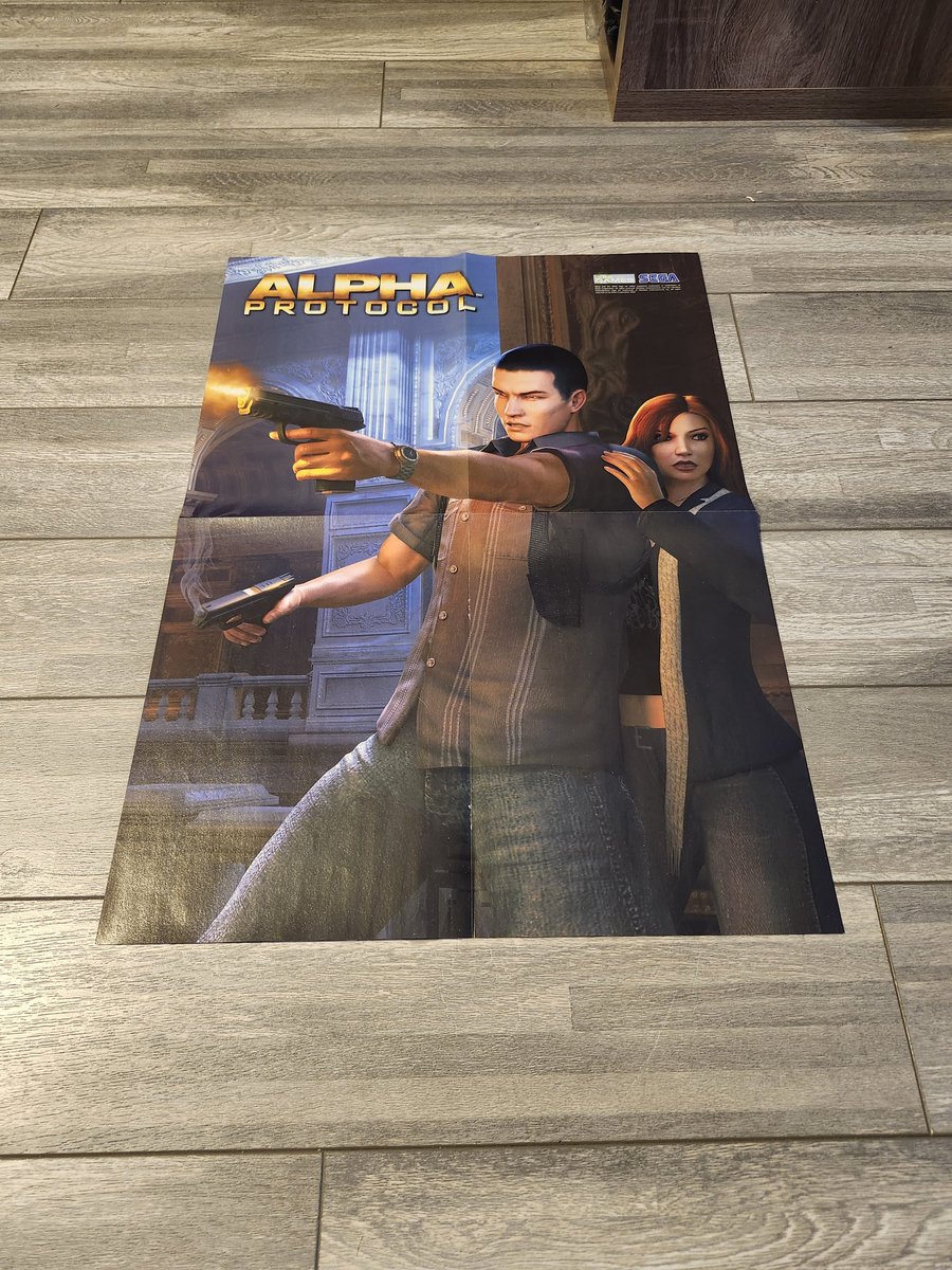 BayoCollector's tweet image. Rare Bayonetta/Alpha Protocol double sided poster from 2009. #Bayonetta #BayonettaCollection #AlphaProtocol