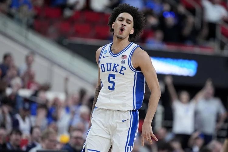 JMannsTakes's tweet photo. Last year in the Elite Eight Tyrese Proctor scored 0pts on 0-9.

This year in the Elite Eight Tyrese Proctor scored 17pts on 7-10. 

Redemption. https://t.co/Ejw0Vxo9UG