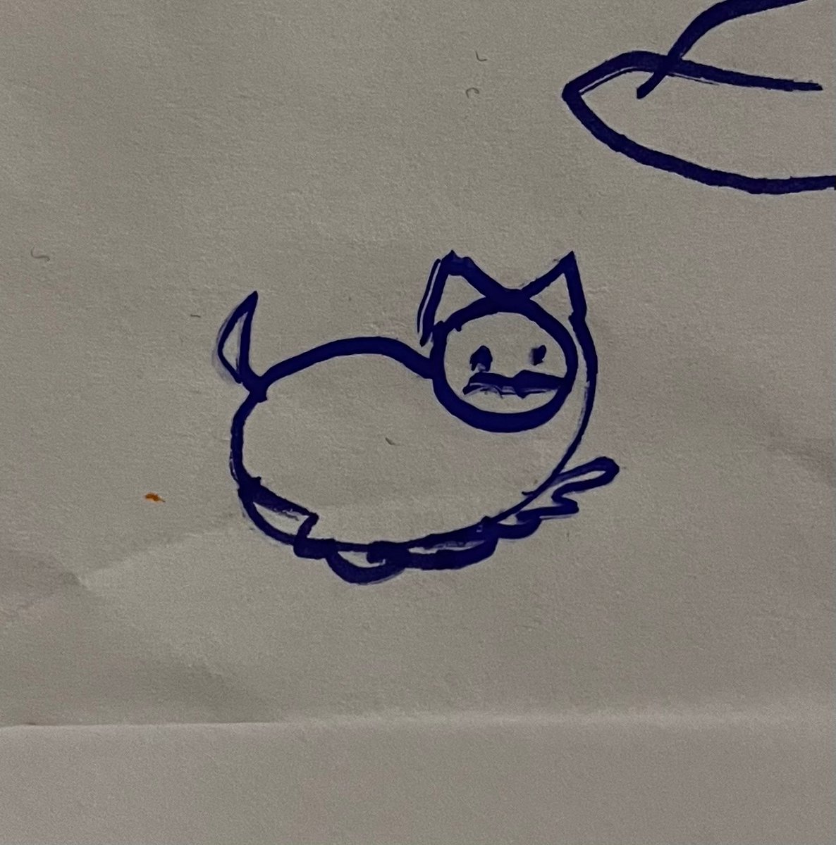 no amount of AI slop could replace this silly cat my mother doodles on every piece of paper she finds