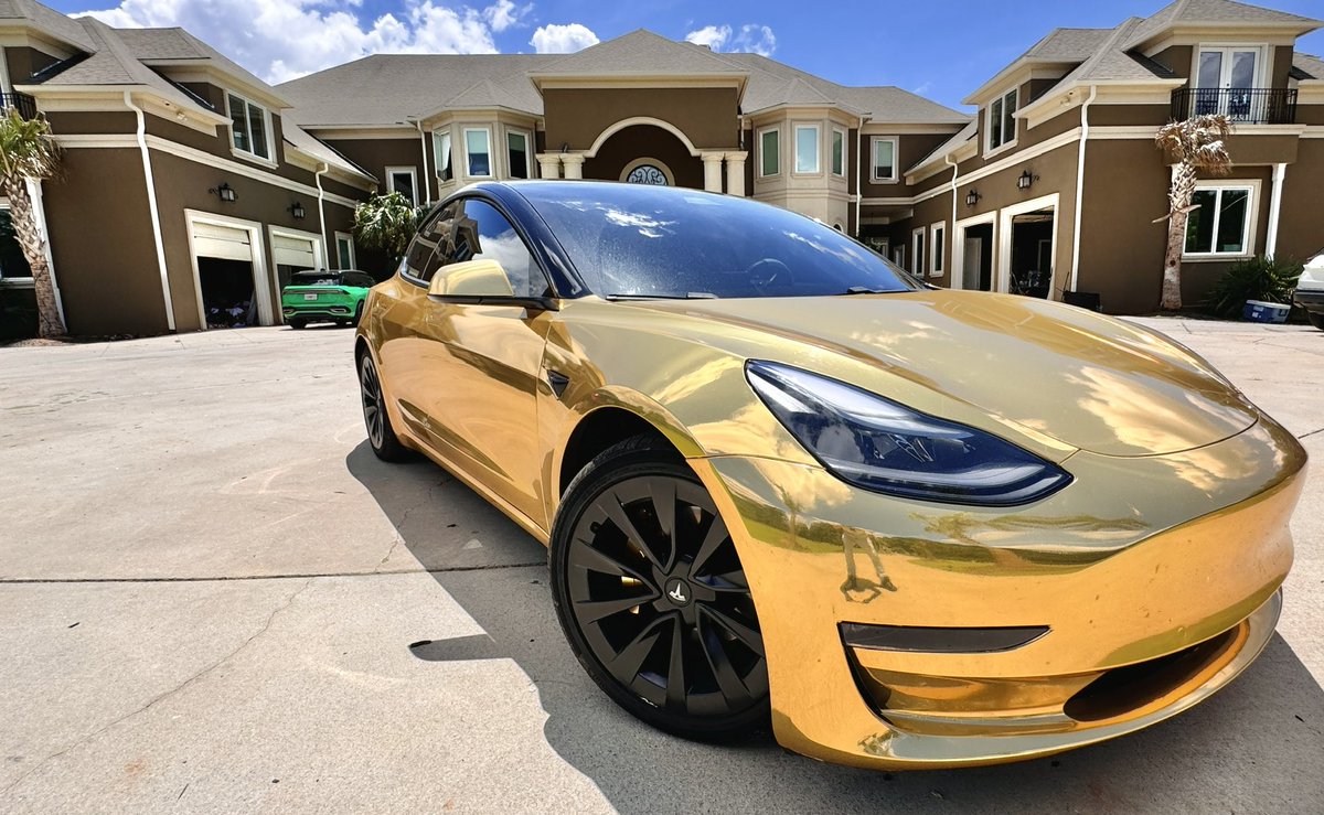 CommonTribeBand's tweet photo. Shout out to everyone who wants me to get rid of this car suddenly. It’s never gonna happen. #tesla #customtesla #goldtesla #24ktesla #goldchrometesla #teslamodel3 #goldchrome https://t.co/GIXvRUUwK4