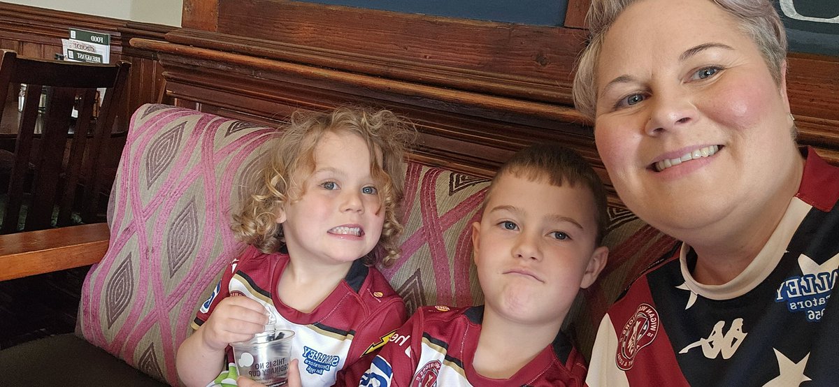 No better way to be spending mother's day than with with these 2 watching rugby. Come on the Warriors 🍒⚪ (Oscar's missing a few teeth now hence the no smile)