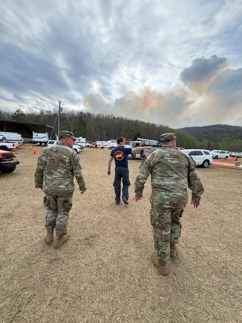 SCSG1670's tweet image. South Carolina State Guard troops are hard at work assisting fire crews at the Table Rock Wildfire event. BG Hollingsworth, DCG of the SCSG, is seen reviewing the latest situation map. #scsg #scwildlife #tablerockcomplex #tablerockcomplexfire #SCMedia #wildfire