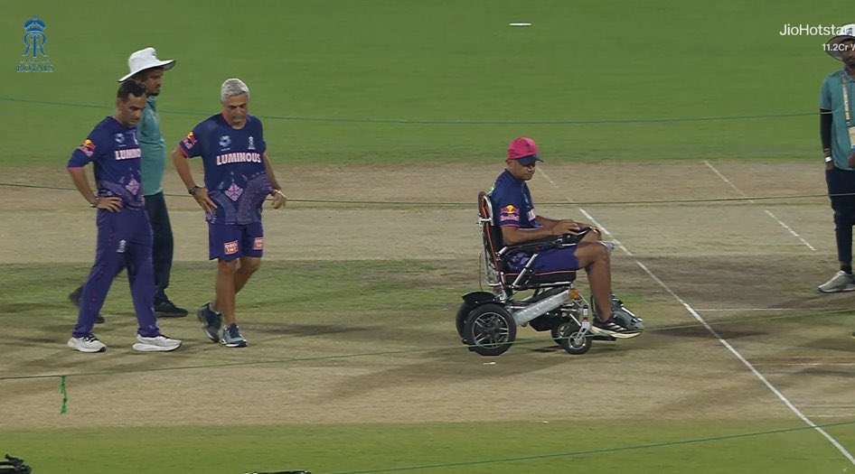 start_of_era's tweet photo. Rahul Dravid checking the pitch on a wheelchair 
#RRvCSK https://t.co/9mz8NrwueV