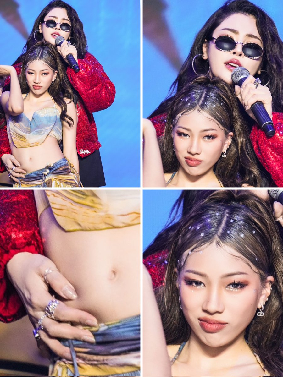 "I got pinched!!!"

"Why so happy?"

The pinched in question:

FAYE TIMELESS LOVE IN BKK
#MGIxFaye1stFanMeeting