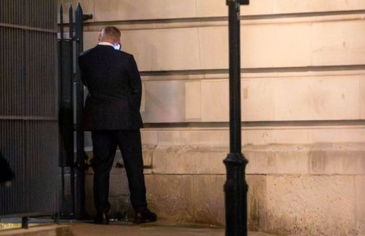 Wayne Rooney being photographed urinating against a wall Wayne Rooney being photographed urinating against a wall