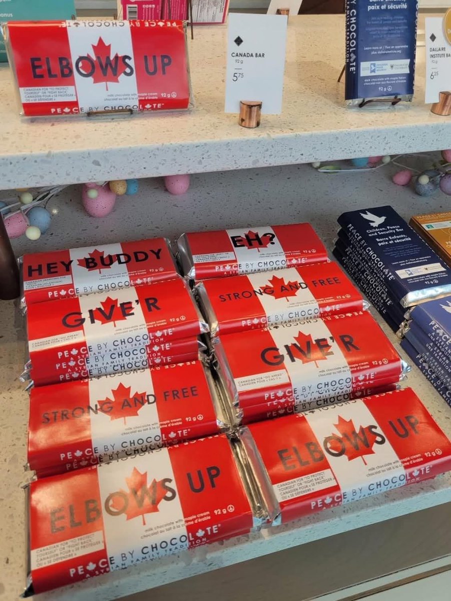 FlaneuseEnVille's tweet photo. There are some interesting slogans offered on these patriotic  Canadian chocolate bars made by Halifax-based company “Peace By Chocolate”. https://t.co/tFyGysi1J2