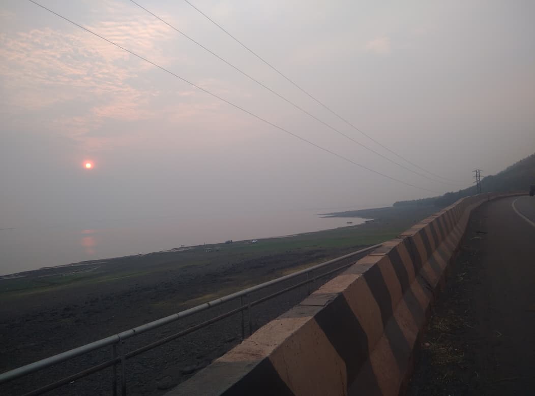 maheshthm's tweet photo. Hosapete, finally back.  The backwater of Tunga Bhadra, the sunset, it's like coming home to a warm hug. https://t.co/Q5EAJZuOlg