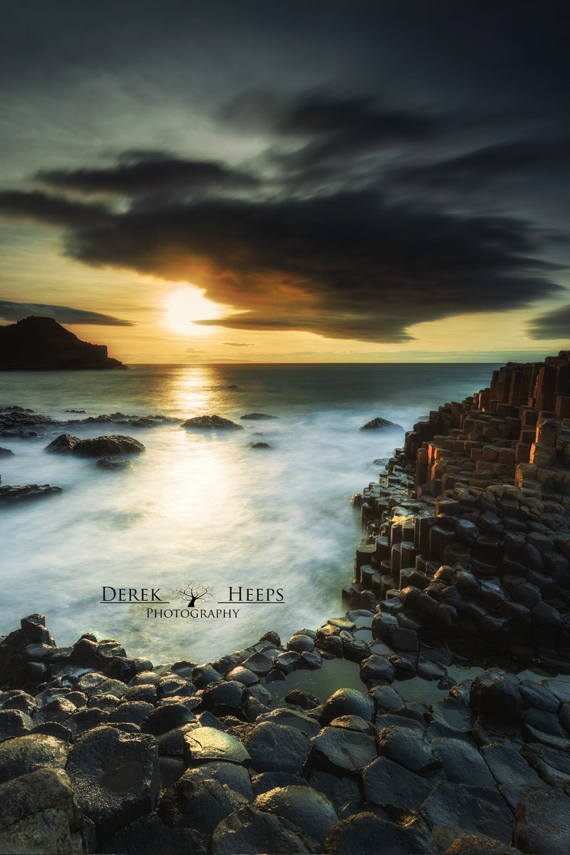 Sunset at the Giant's Causeway.

Another from my visit last week. This was the first photo I took that evening and the last I worked on.

Was a lovely evening with a great surge in the Ocean.