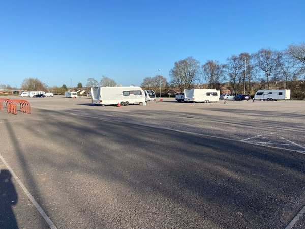 ExeterNeedsChg's tweet photo. A large group of travellers have moved into @TheArenaExeter taking over the entire car park.🫤🫤  No one knows when they'll leave.

This situation clearly needs sorting. Residents are frustrated, and rightly so. This space is meant for public use, not to be taken over. Endless evictions and clean-up costs and this continuous circle is insanity.  

There are reports that yesterday a 13 year old girl was assaulted & stamped on her head.  Outrageous.😠

This is a national issue that needs to be addressed.

What is @LizPoleLabour doing about it?

@reformuk ,our DCC candidates @alee3182 & @EdHill_ReformUK will deal with it 👍👍🇬🇧🇬🇧