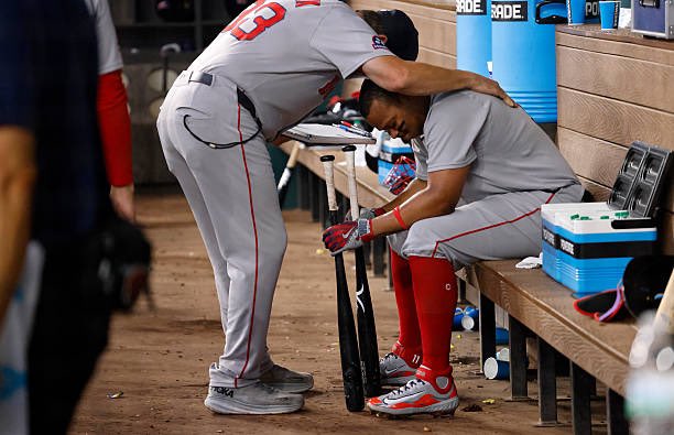 Jason Varitek with Rafael Devers.