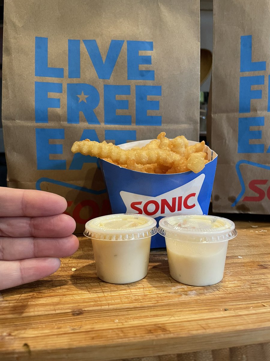 LoJazzmann's tweet photo. @sonicdrivein SO YOU’RE TELLING ME that I paid $2… for this… “side” of queso, when I get more listerine in a cup at the dentist than this garbage. And they give me a toothbrush…… SMALL FRY for reference…

#shrinkflation https://t.co/yT7P2EuE58