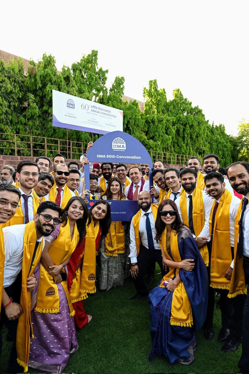One last group pic. One last burst of laughter with their homies. One last photo by the #RedBricks before they graduated from #IIMA. 📸 
As our graduates strike a pose with their friends at #IIMA60thConvocation, these frames become keepsakes of a journey they'll cherish forever.