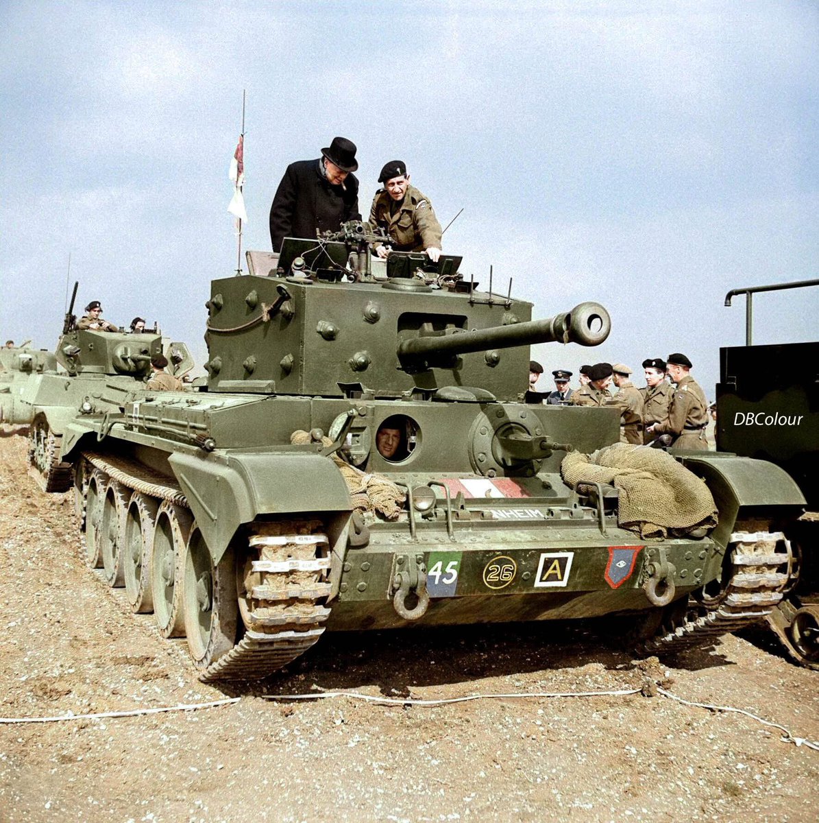 colour_history's tweet image. 31 March 1944
Winston Churchill inspects a Cromwell Mk IV tank of No. 2 Squadron, 2nd (Armoured Reconnaissance) Battalion, Welsh Guards, at the Searchlight Field, Whitby Road, Pickering in Yorkshire.