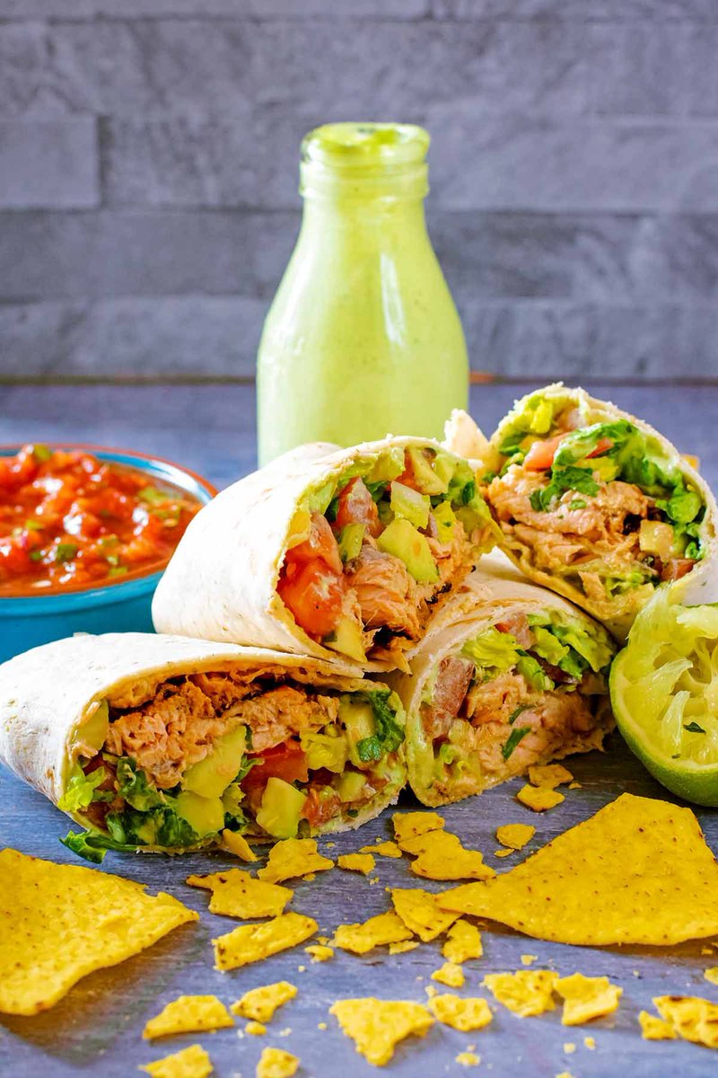 If you love the light and fresh flavours of fish tacos, then you are going to love this easy Salmon Burrito recipe. Flakes of spicy grilled Mexican salmon on top of a crunchy avocado salad, hungryhealthyhappy.com/salmon-burrito… #salmonrecipe #burrito #burritorecipe
