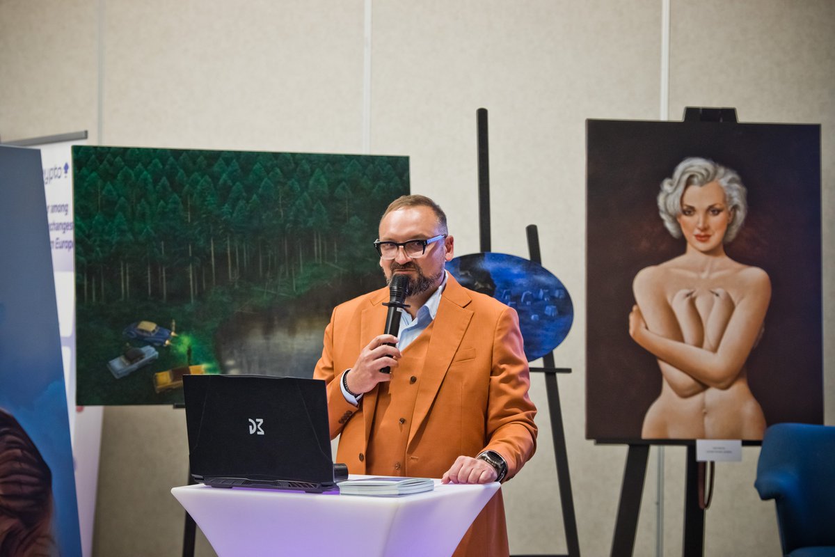 At Tech of Tomorrow 2025, the SmartVerum Gallery explored how tech and art come together - blending traditional works with NFTs. With standout moments like a Rafał Olbiński auction and a panel on art tokenisation, it was a bold look into the future of creativity.